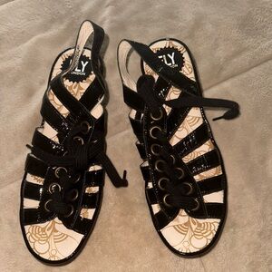 Fly London Black Patent Lace Up Wedge Sandals.